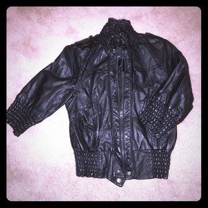 Black faux leather bomber jacket.